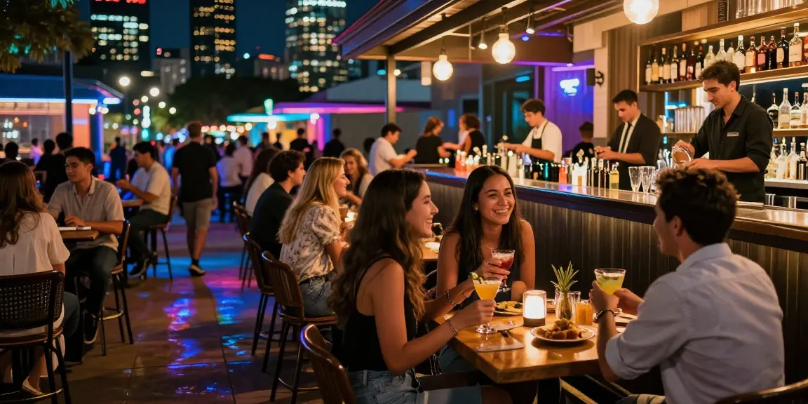 Engaging nightlife at a 유흥사이트 with friends enjoying drinks and vibrant atmosphere.